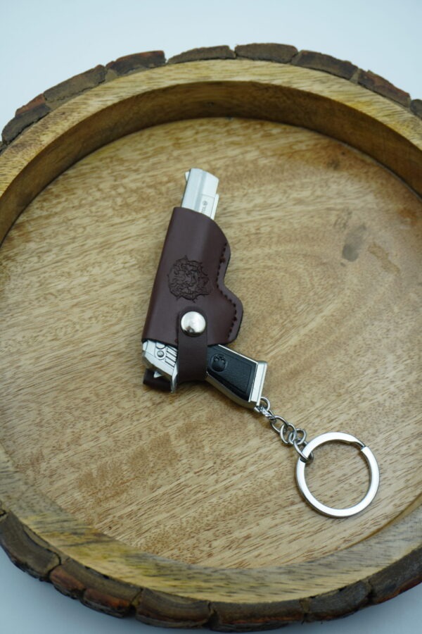 AG-K-02-B-scaled-1.jpg Gun-Shaped Keychain